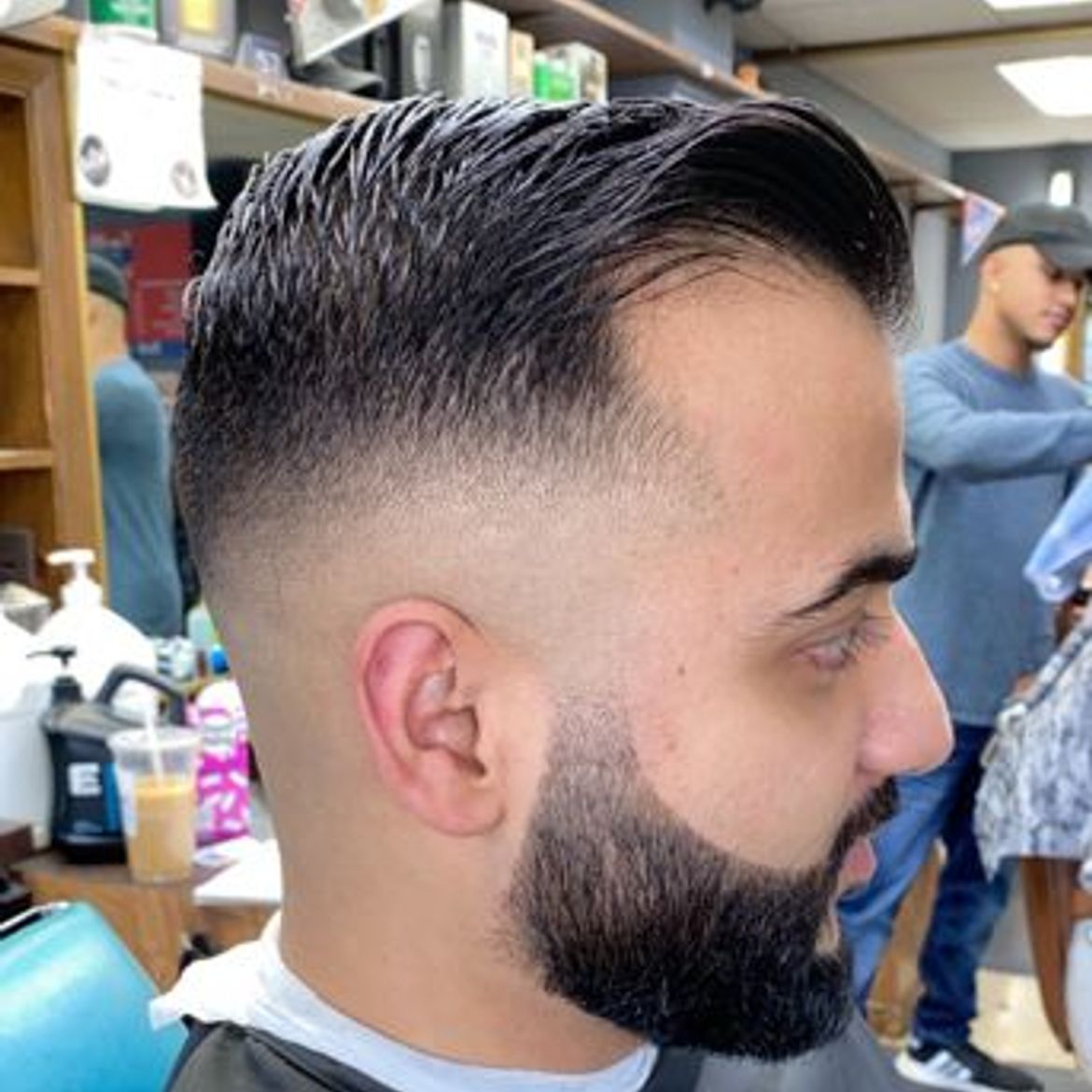 Clean men's fade with beard trim