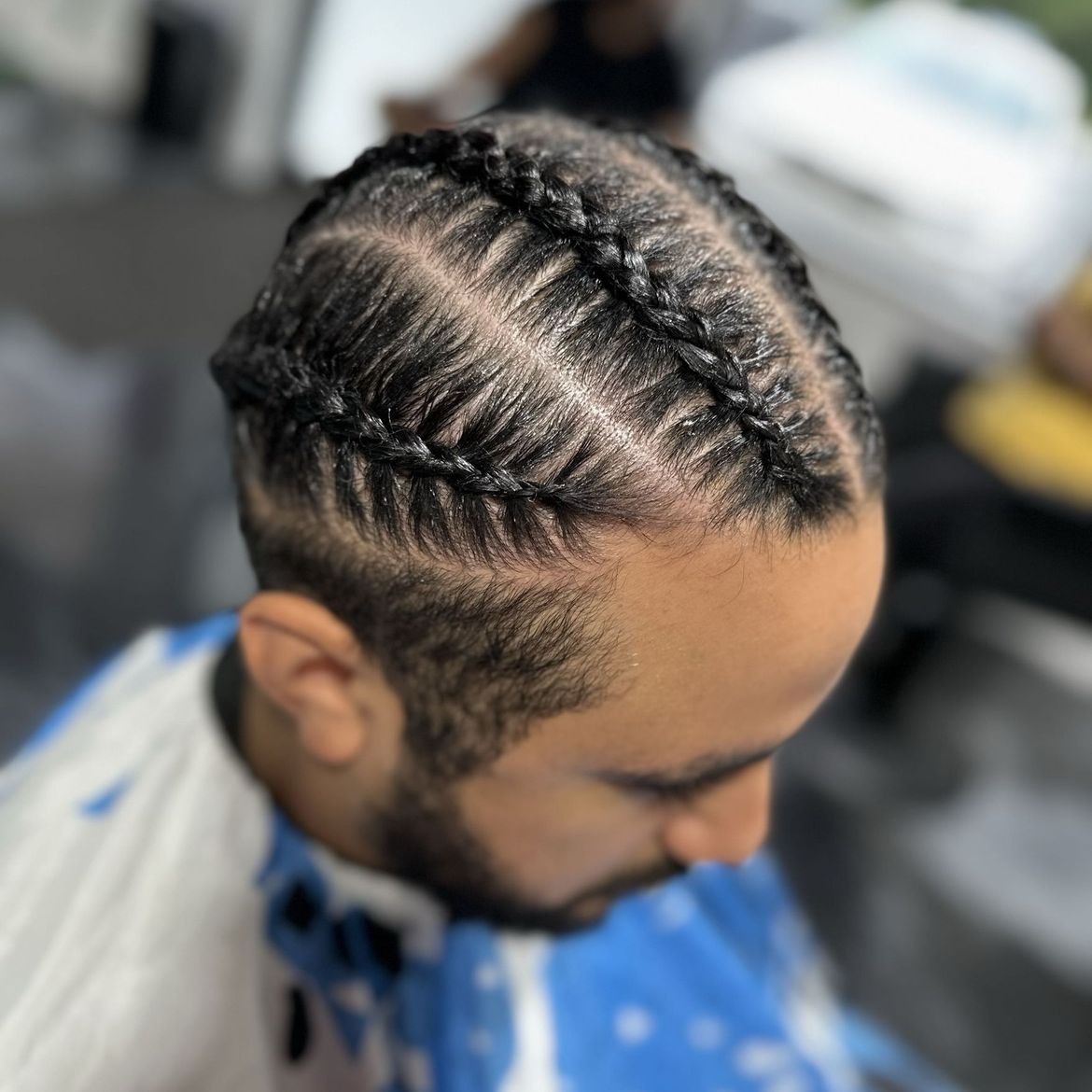 Intricate men's braiding patterns